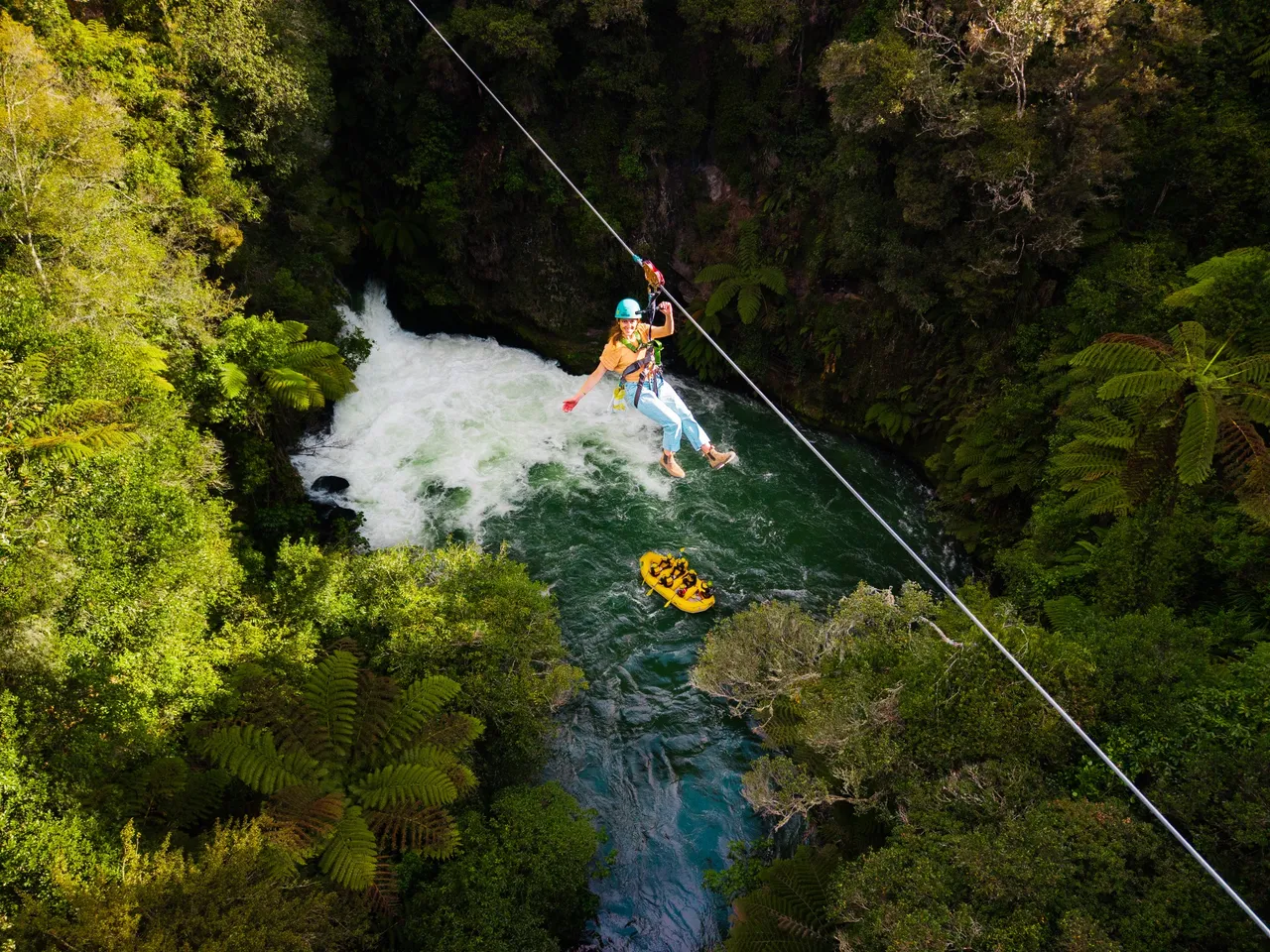 Ziplining over Tutea Falls and Rafters