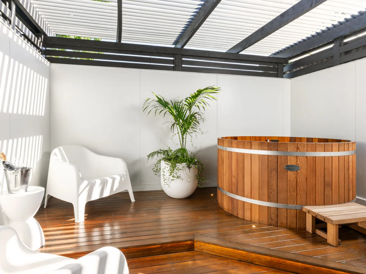 Deluxe Room with a private deck and hot tub at the Millennium Hotel Rotorua