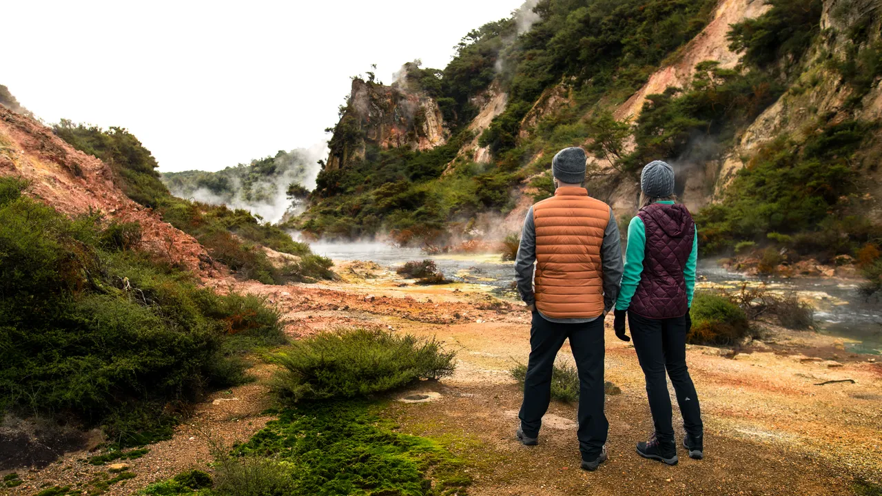 Waimangu Volcanic Valley_geothermal river couple_credit Waimangu Volcanic Valley