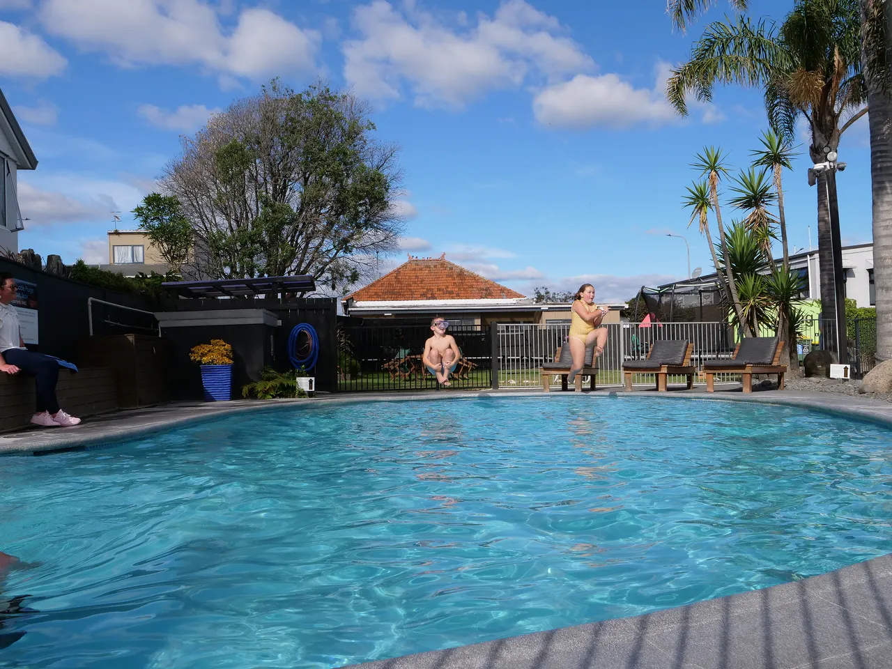 Aura Accommodation_children jumping pool