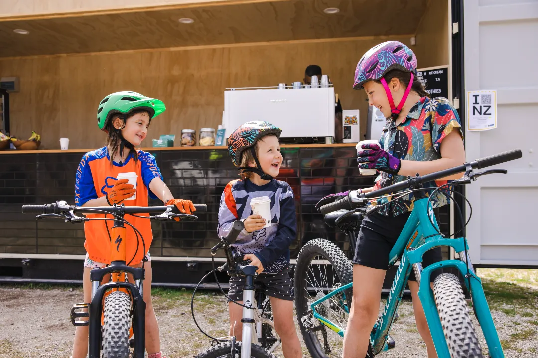 Whakarewarewa Forest Loop_Kids enjoying hot drink at Te Putake O Tawa Carpark_credit Graeme Murray