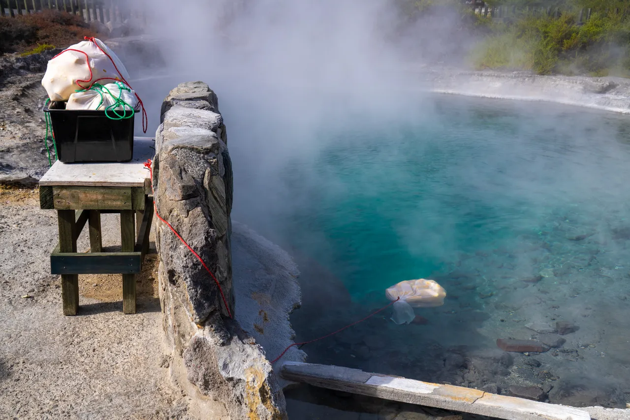 Corn on the cob cooking in a geothermal pool 