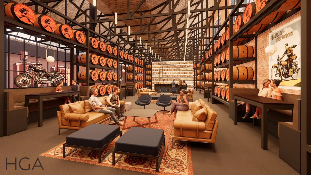 Guests relax in a lounge surrounded by motorcycles and rows of orange Harley-Davidson barrels.