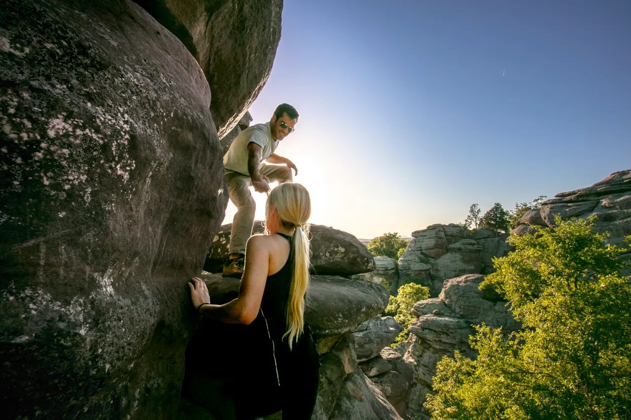 Couple Climbing Up at Garden of the Gods