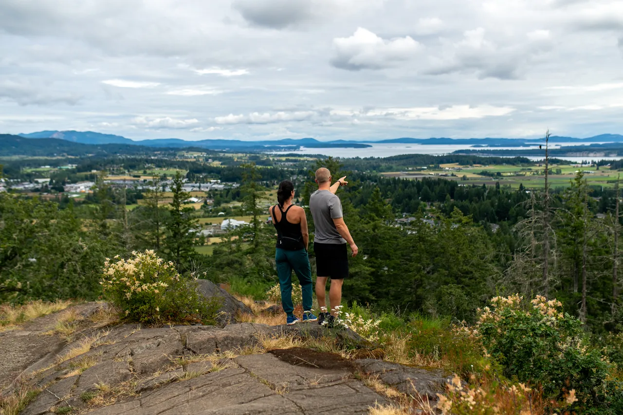 Couple standing at lookout - 1 - Dr. Sienna Bourdon