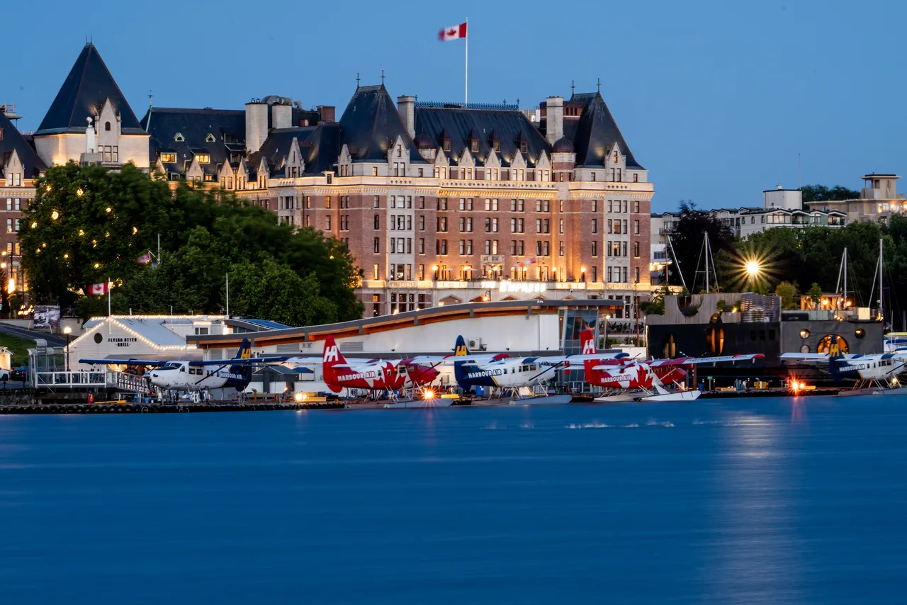 Downtown Harbour with Planes and Hotel at Night Downtown