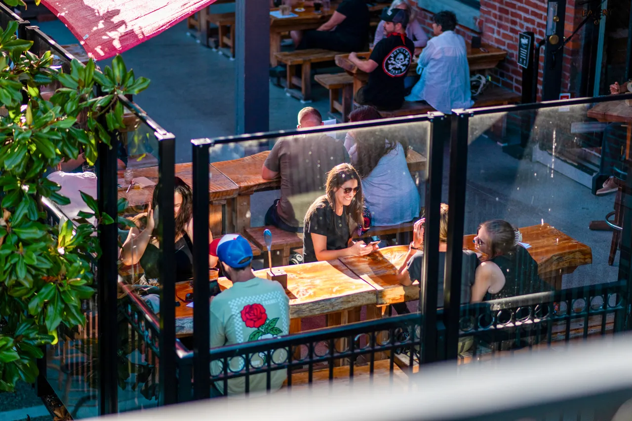 People on restaurant patio - 19