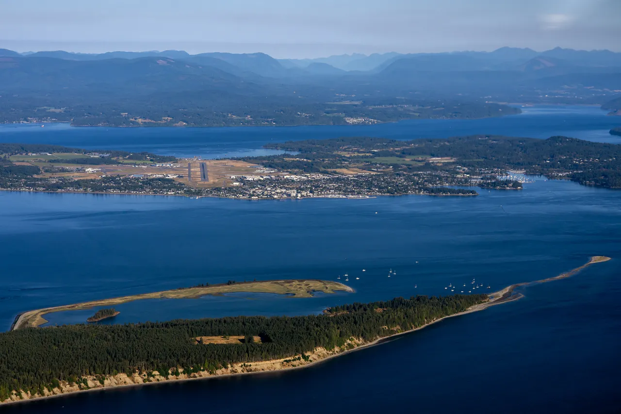 Aerial Photo of Sidney Spit and Airport with Trees and Sky
