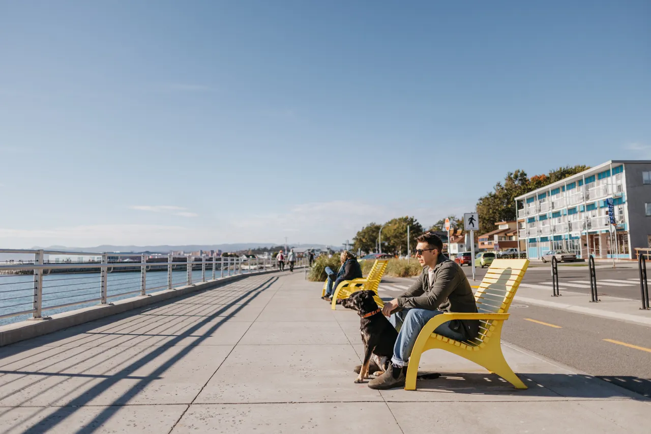 People lounging by ocean - 2