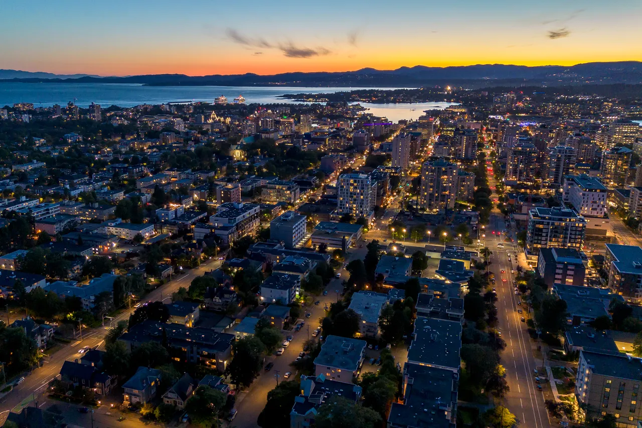 Aerial Photo at Night Overlooking City, Tall Buildings and Roads