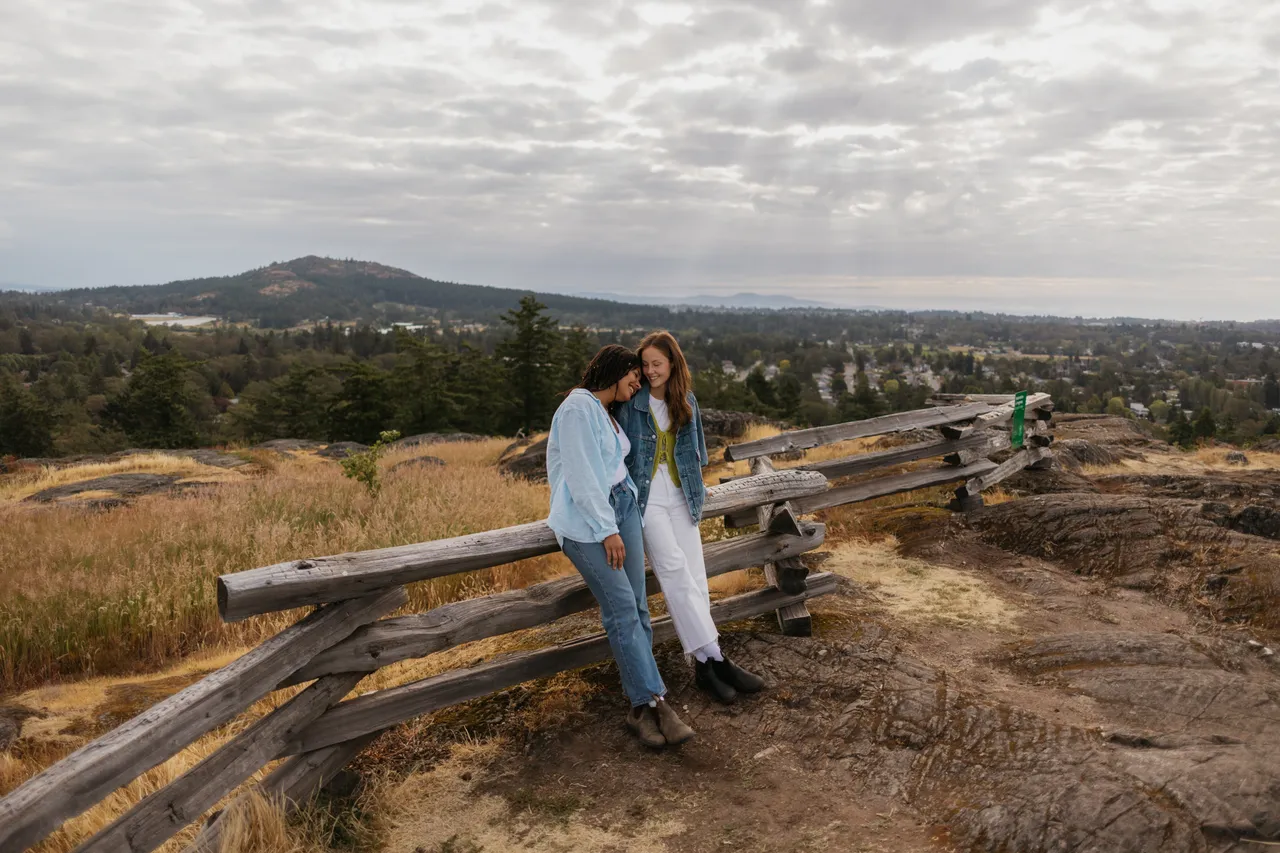 Peaceful moment on a hill overlooking distant forests