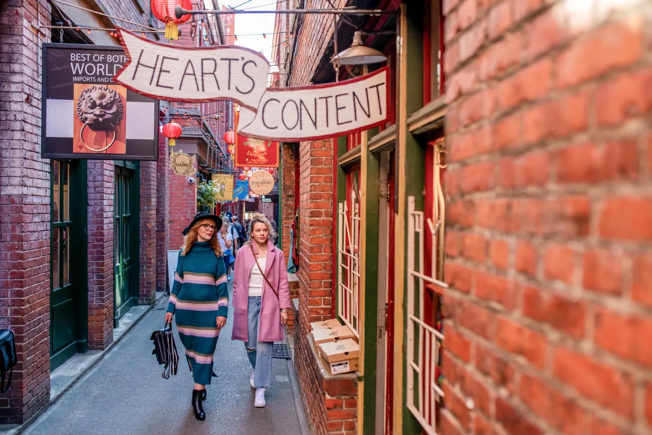 People walking through Fan Tan Alley - 1 - Victoria