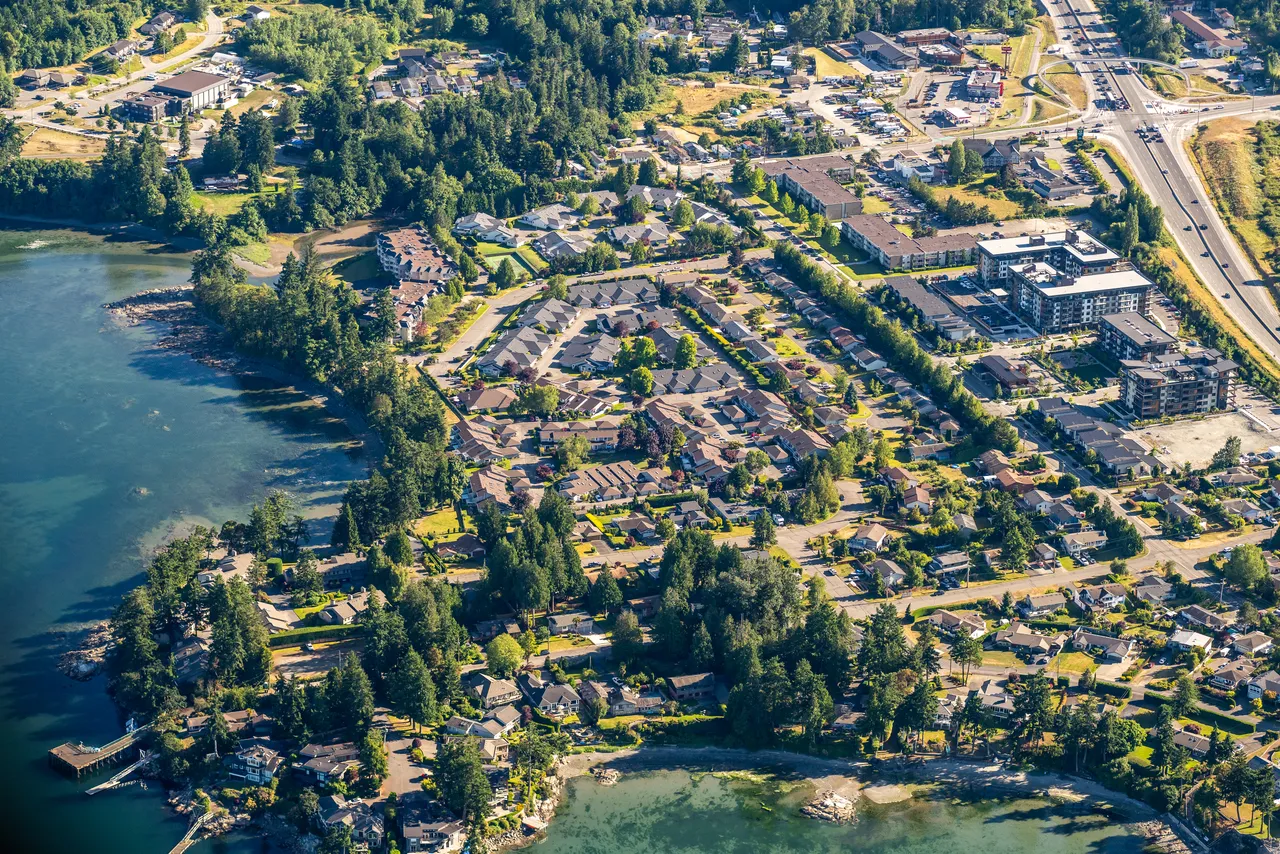 Saanich looking South with Ocean, Trees and Buildings