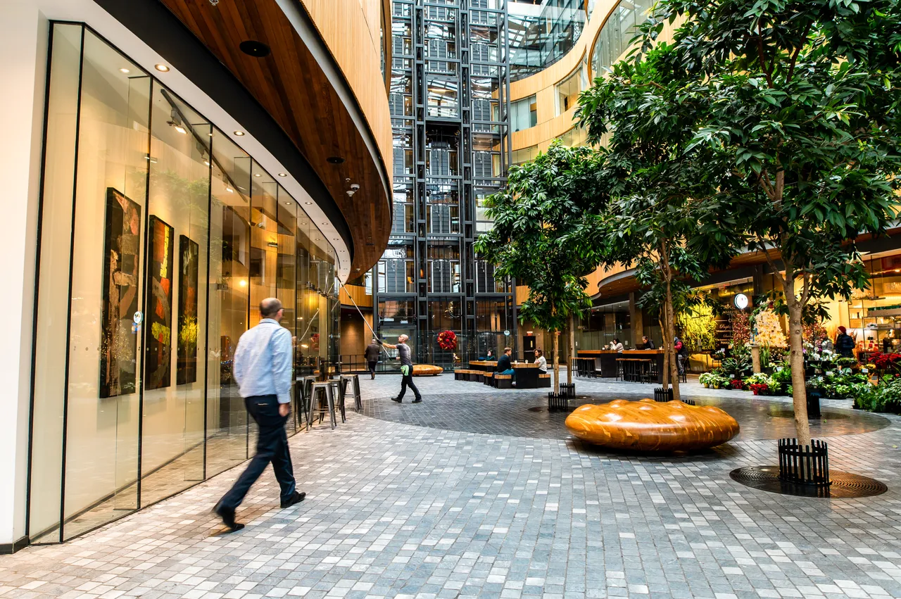 People walking in atrium - 1