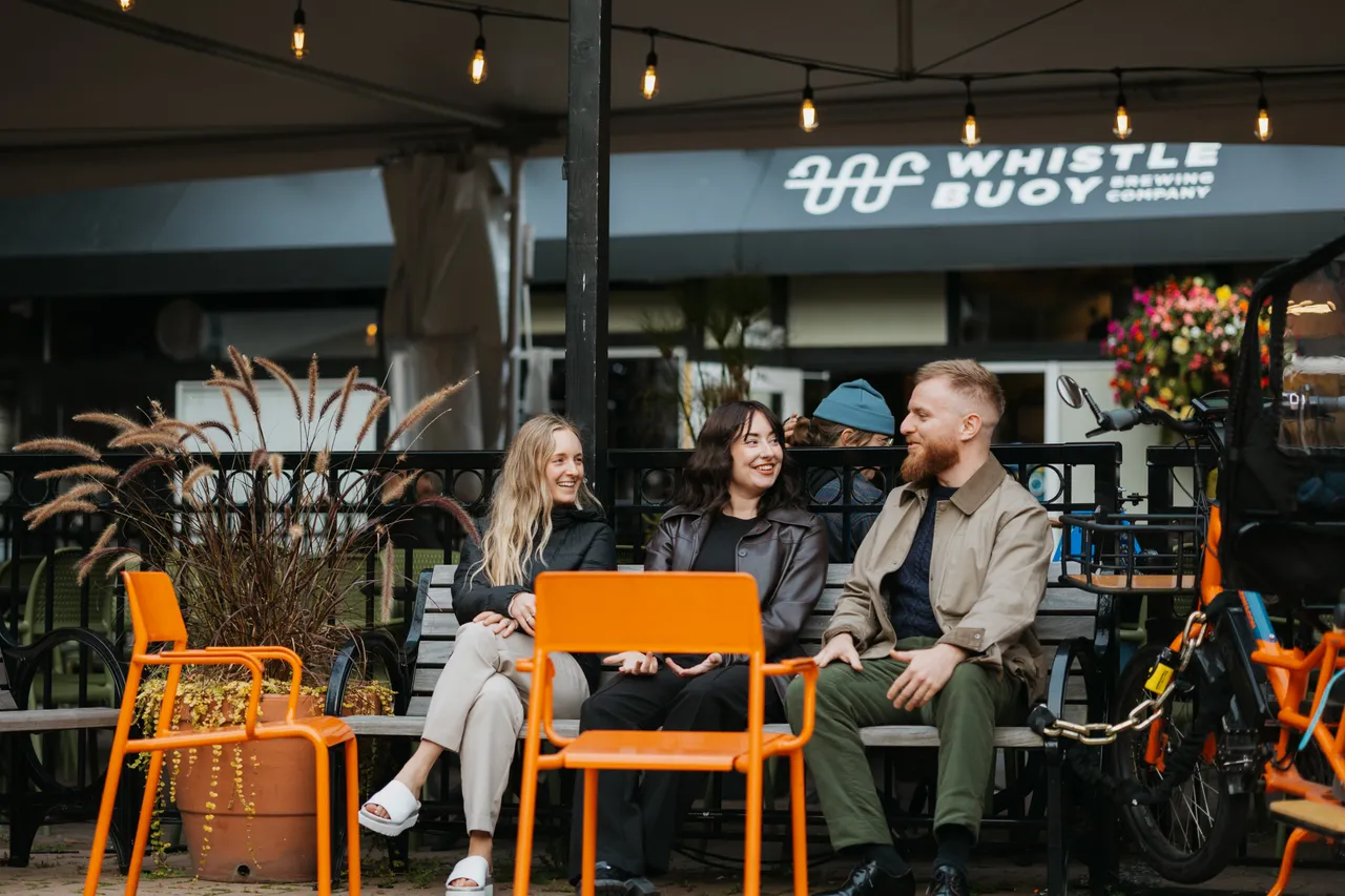 Group sitting on bench - 1 - Victoria