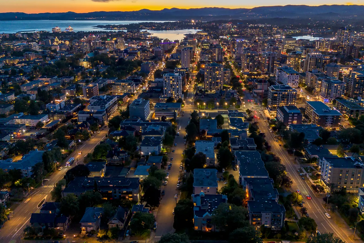 Aerial Photo Overlooking City with Lights at Night