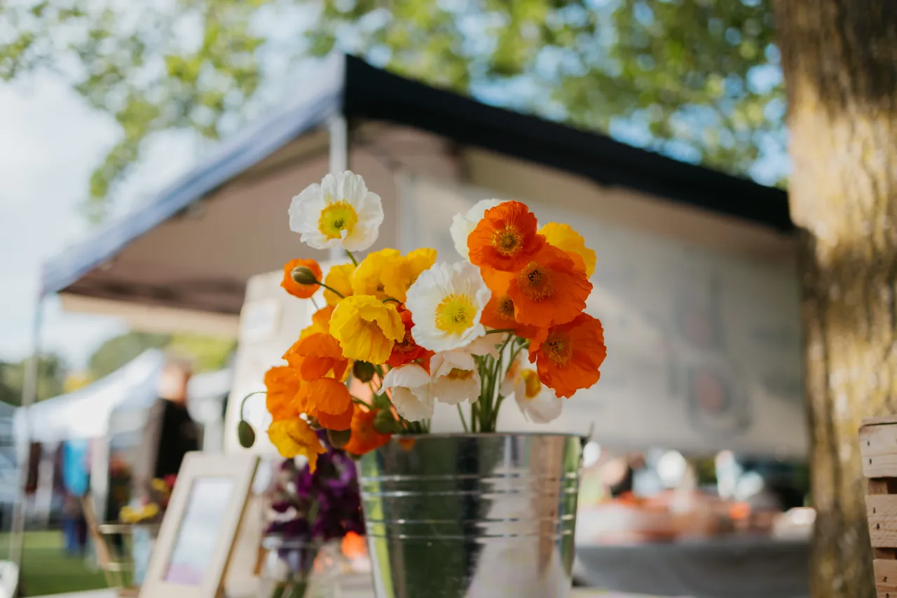 Batch of Flowers at Outdoors Market with White, Orange and Yellow Colours