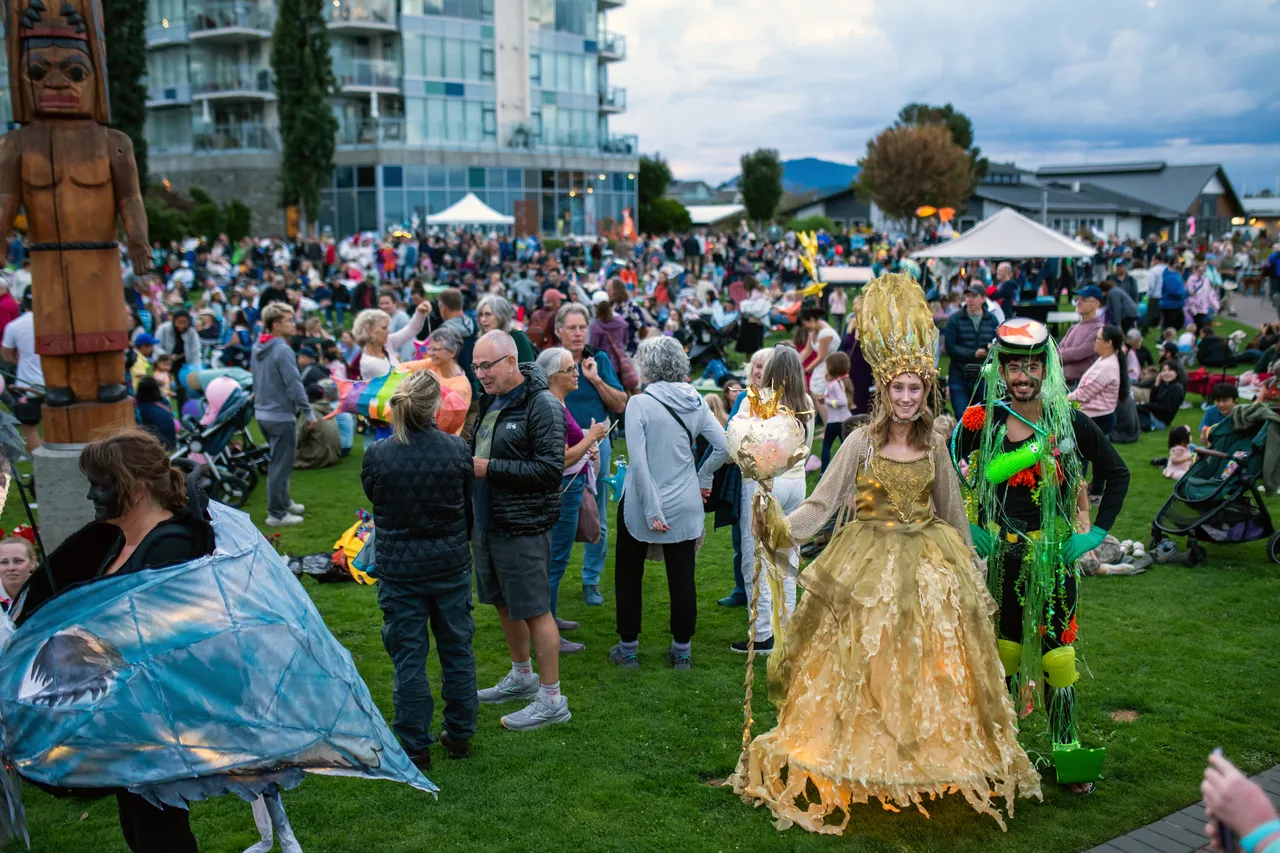Outdoor festival with medieval costumes on cloudy day