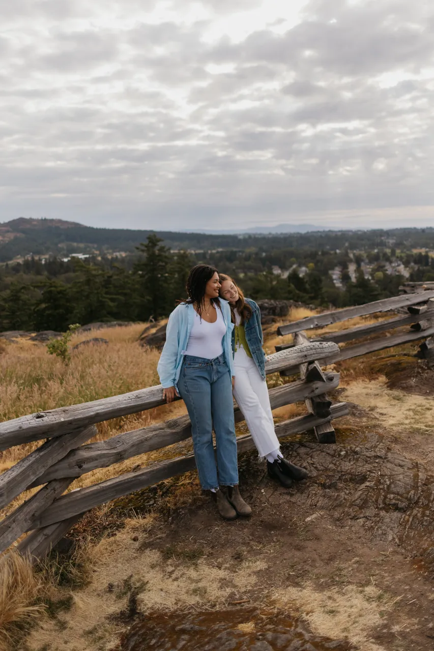Couple sharing a quiet moment overlooking rolling hills