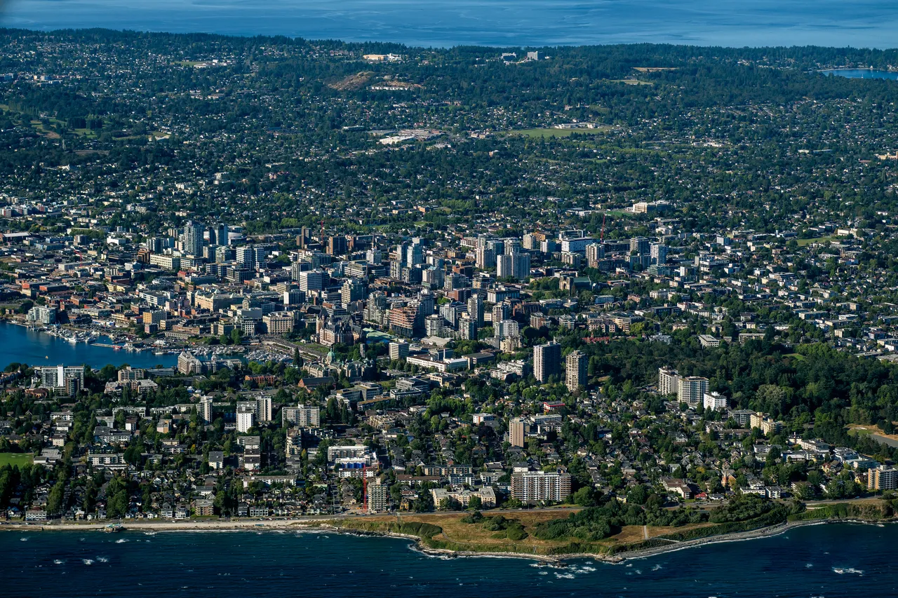 Aerial of Greater Victoria including City, Trees and Ocean