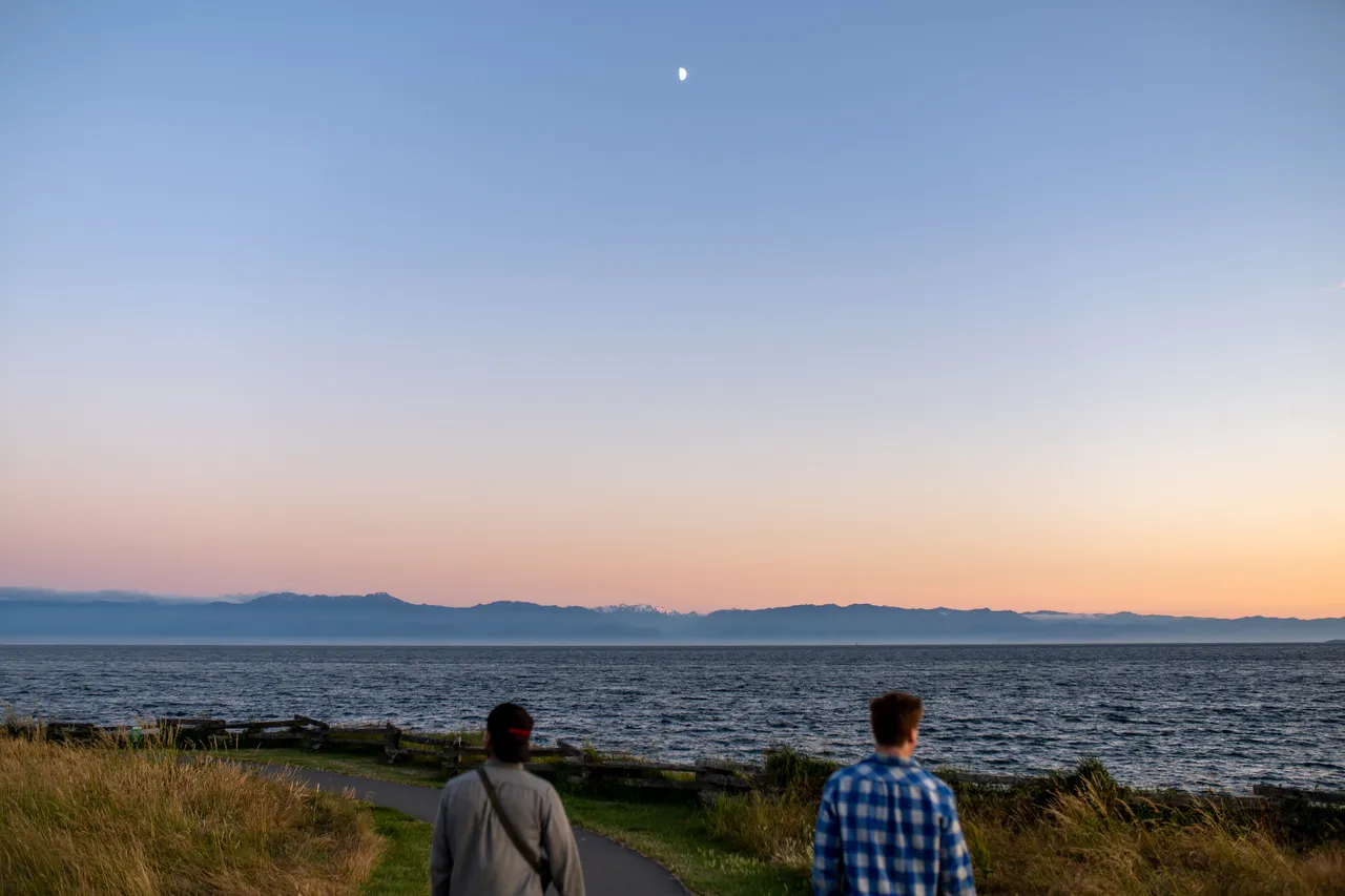 Two People Facing the Ocean on Dallas Road