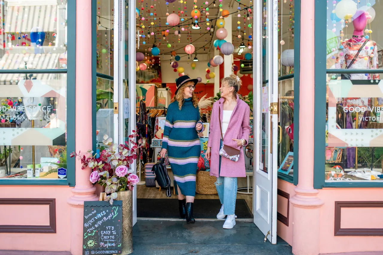Women exiting store - 2 - Victoria