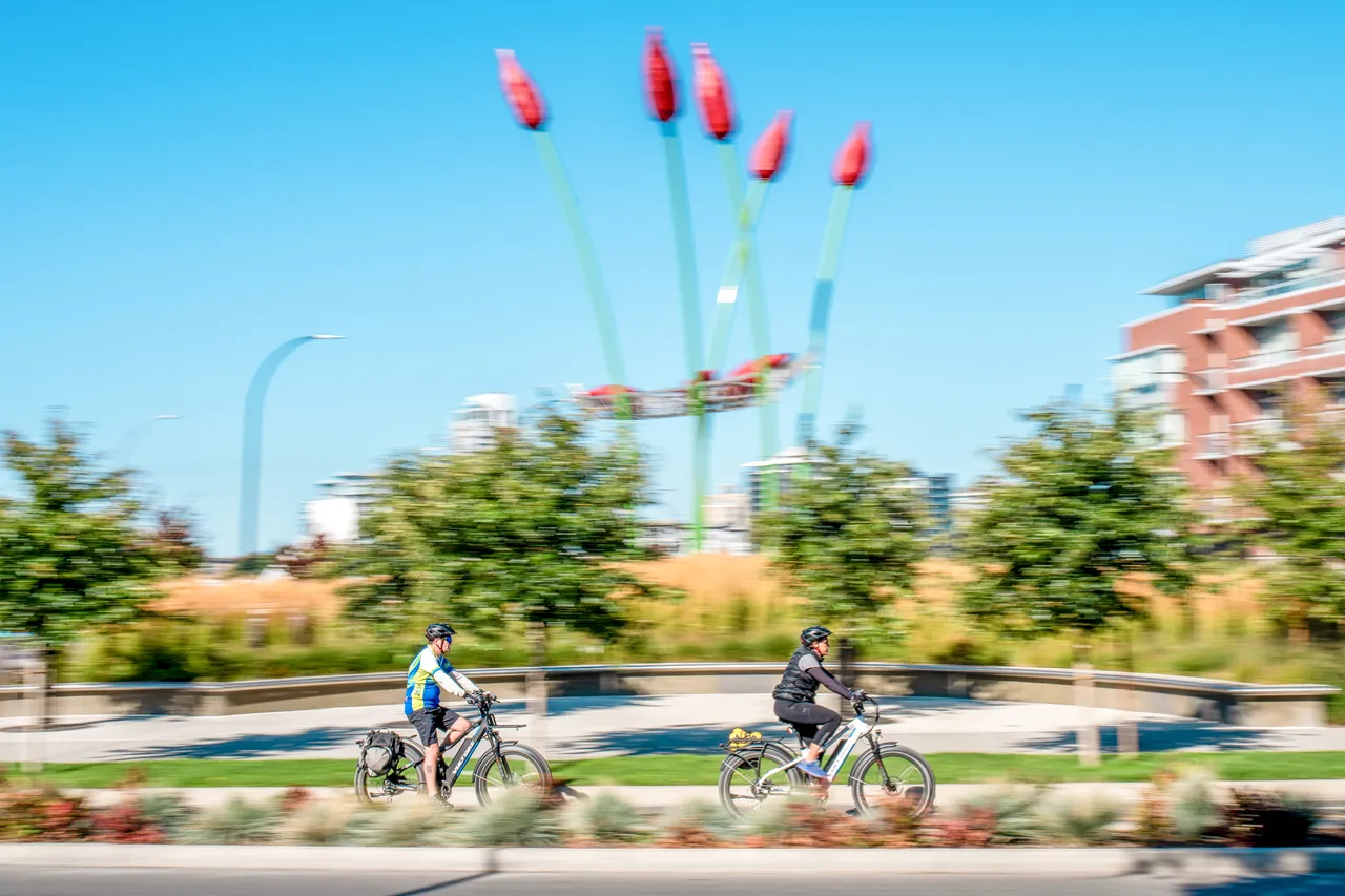 Cycling by tulip sculpture - 4 - Victoria