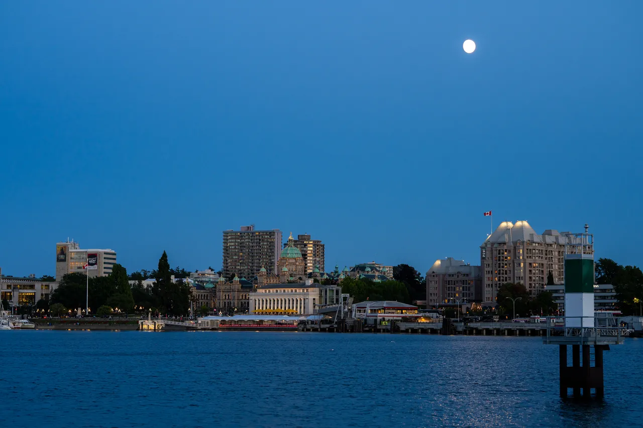 Night Sky Overlooking Downtown Core with Buildings and Ocean