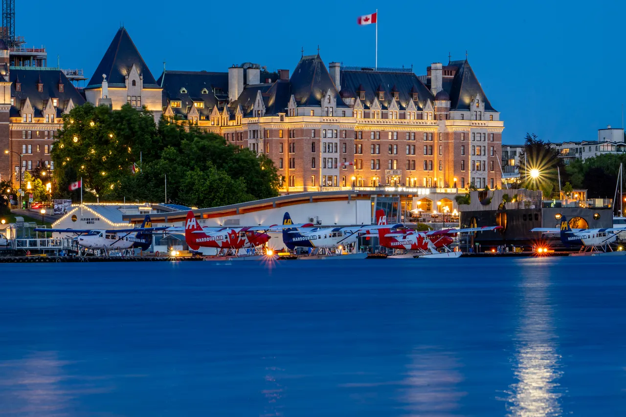 Harbour Planes in Front of Hotel Buildings on Water