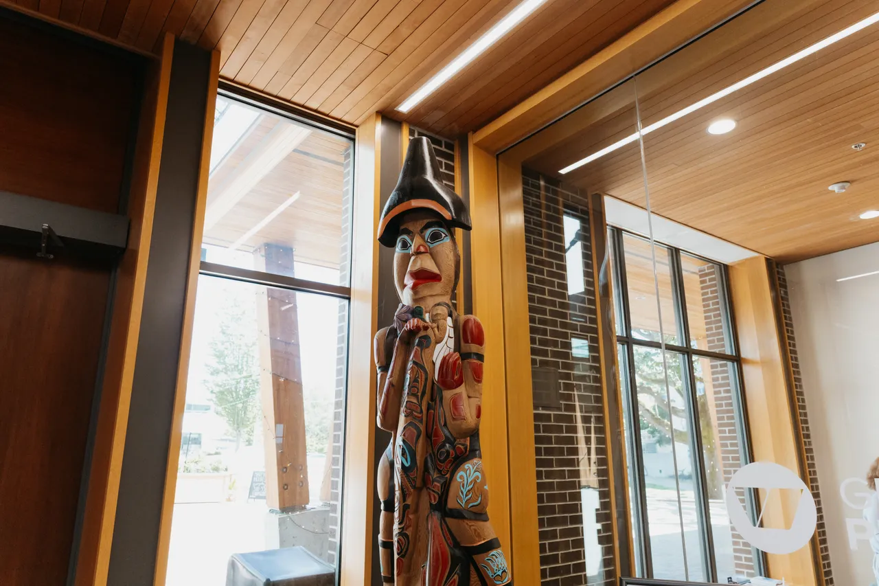 Inside Greater Victoria Public Library with Wooden Statute