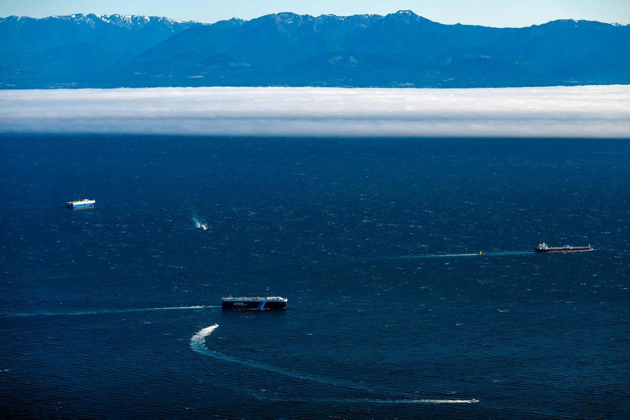 Strait of Juan de Fuca Aerial Overlooking Ocean, Boats and Mountains 2