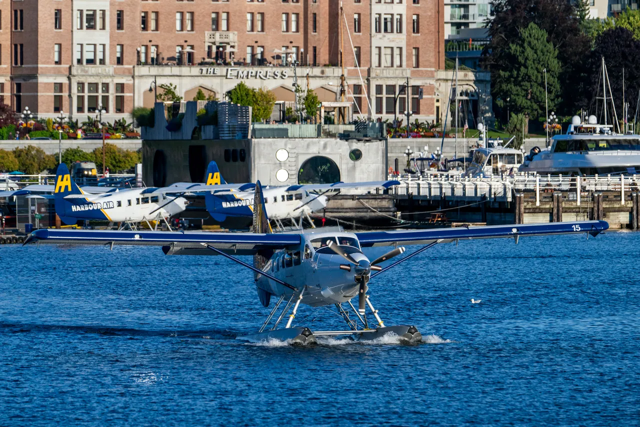 Harbour Airplane Taking Off Near Water Downtown
