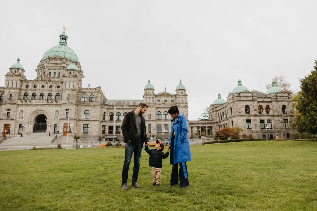 Family by Parliament Buildings in Victoria British Columbia