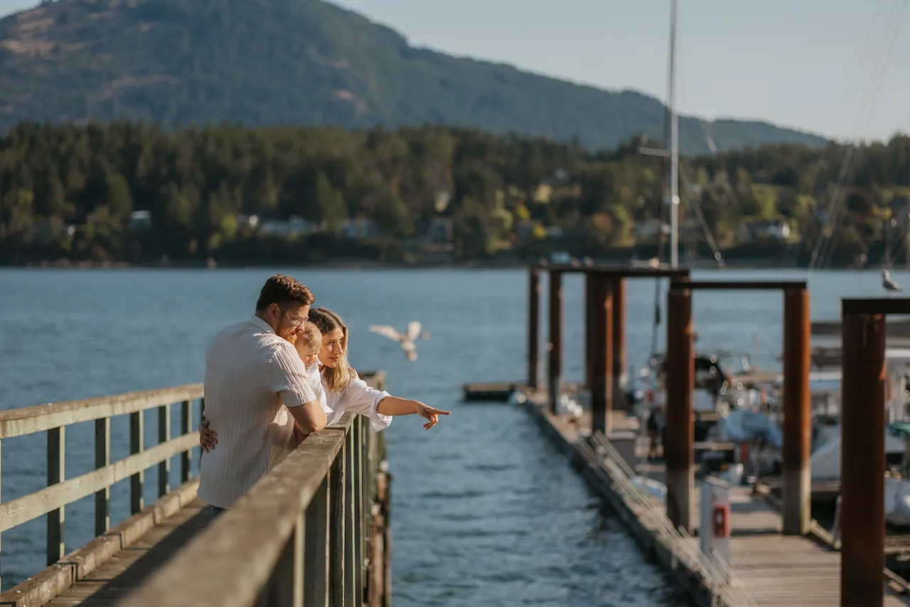 Couple enjoys a peaceful moment on pier at sunset