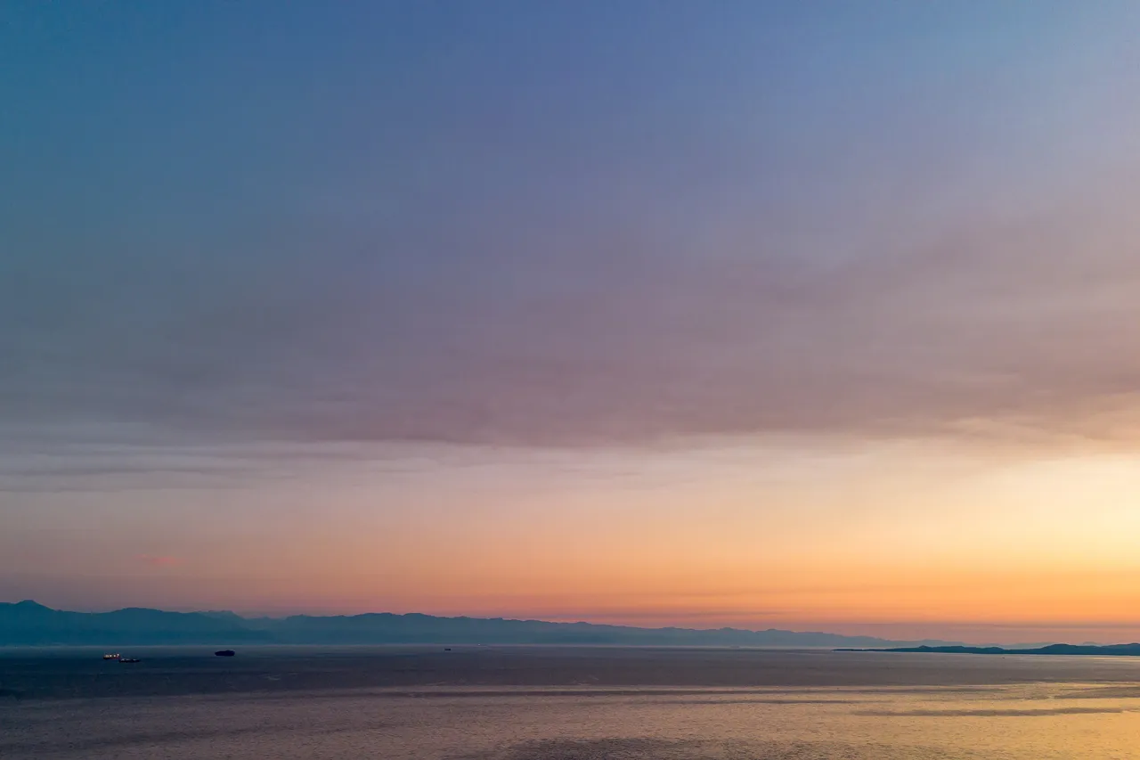 General Sunset Shot with Clouds Overlooking Ocean