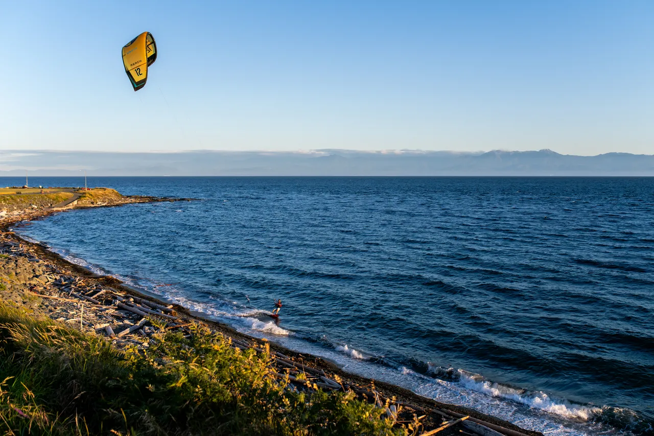 Person Paragliding on Dallas Road near Ocean