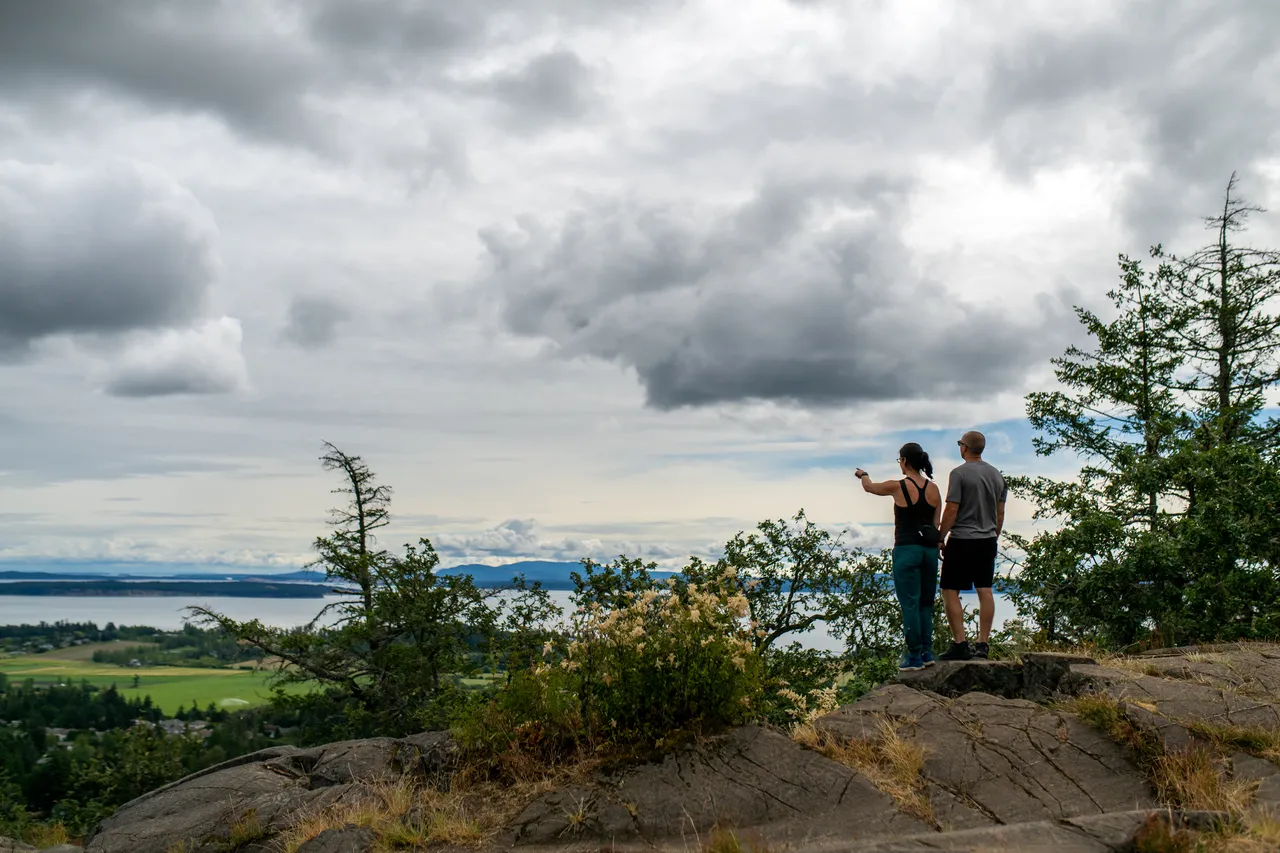 Couple standing at lookout - 2 - Dr. Sienna Bourdon