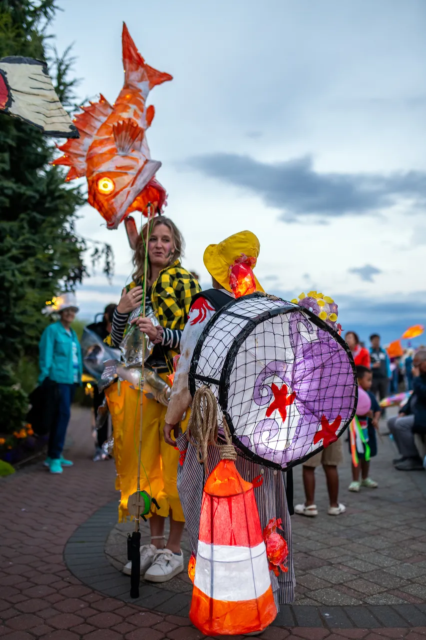 Colourful parade and costume on cobblestone