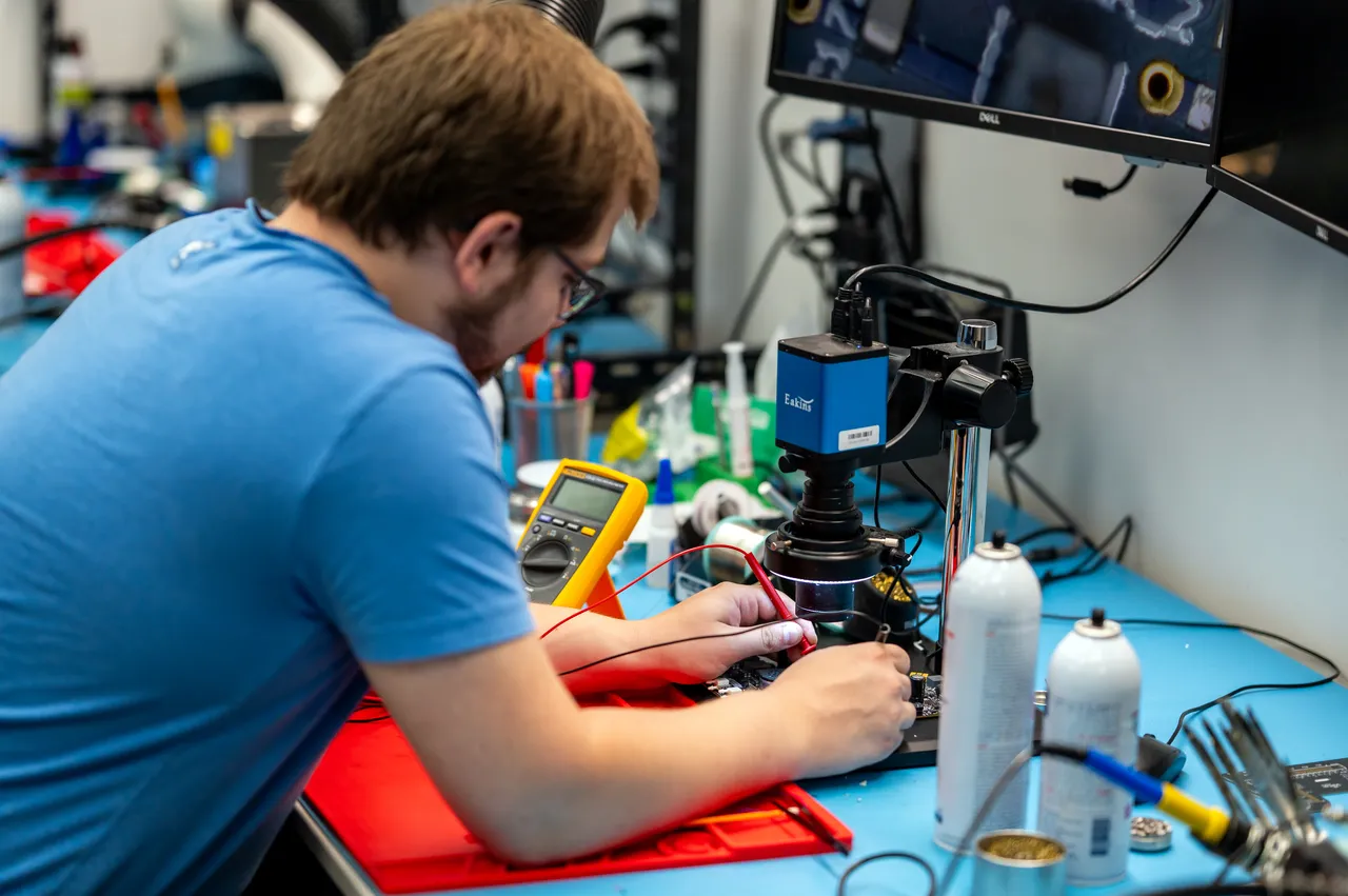 Engineer Working on Technology in Medical Manufacturing Lab