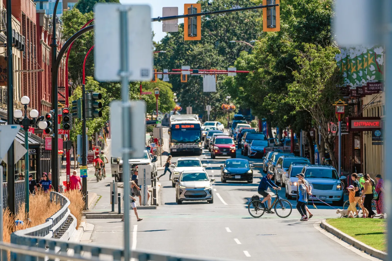 Cars and people on street - 1