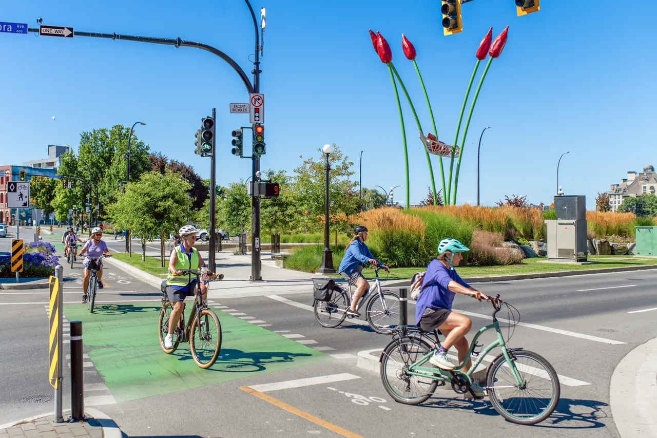 People cycling on street - 1 - Victoria