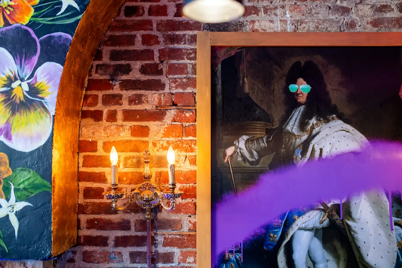 Photo of Friends of Dorothy with Art, Brick Wall and Purple Streak