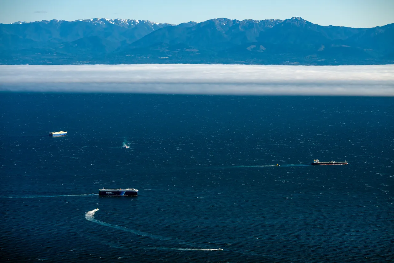 Strait of Juan de Fuca Aerial Overlooking Ocean, Boats and Mountains