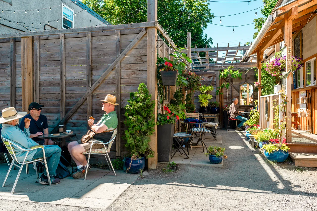 People on restaurant patio - 14