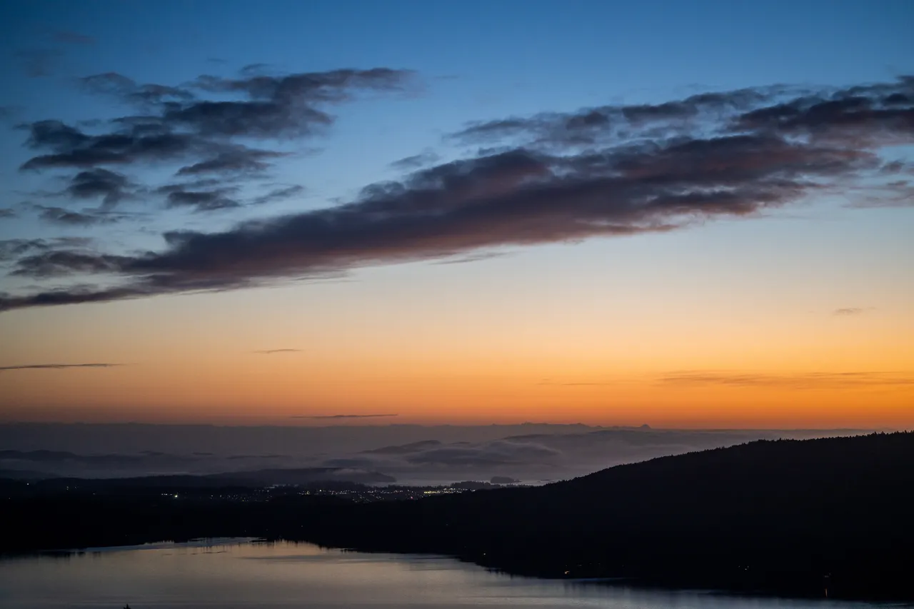 Aerial Photo of Sunset with Clouds, Orange Sky and Silhouette of Island