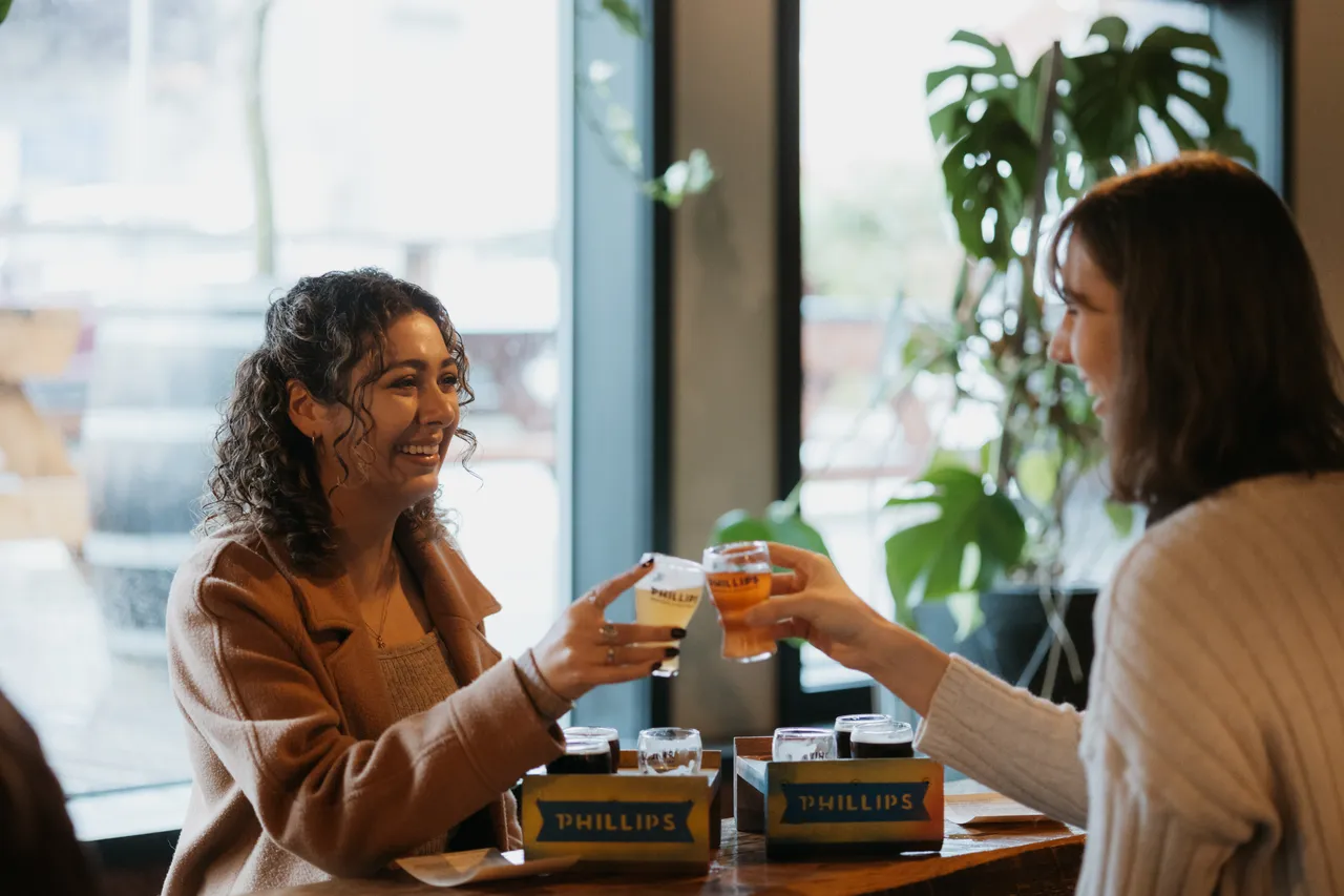 Women clinking beer flights - 1 - Phillips - Victoria