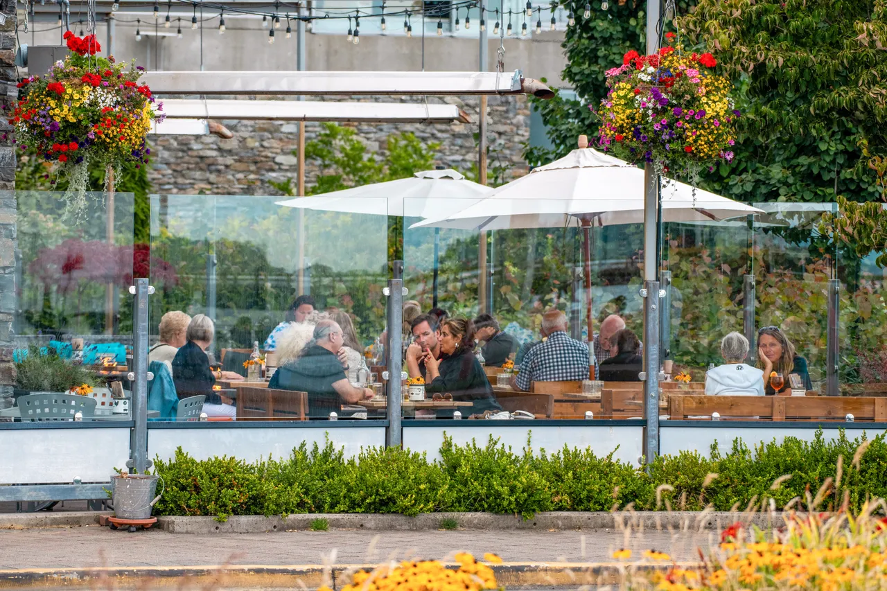 People on restaurant patio - 17
