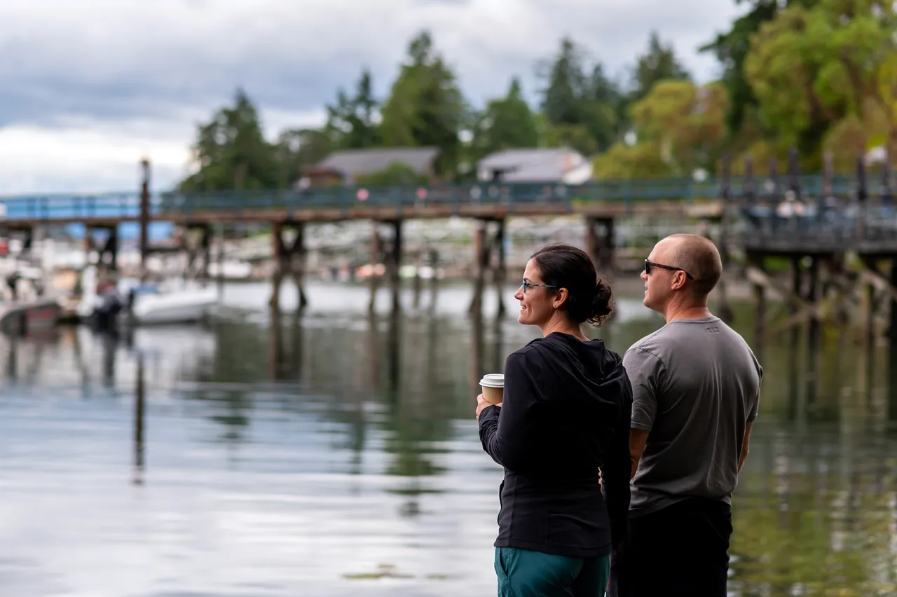 Couple standing by water - Dr. Sienna Bourdon - 1