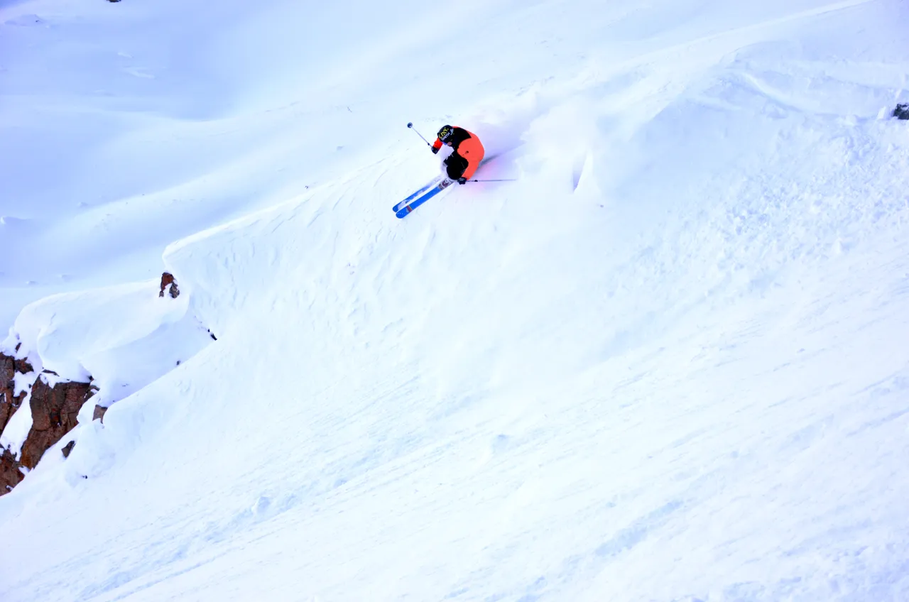 Powder skiing - snowboarding