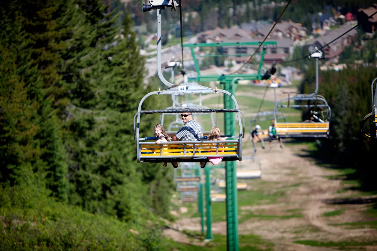 A family on a sightseeing chairlift ride